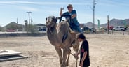 Peggy Barthel rides a camel - a symbol of the area_s history