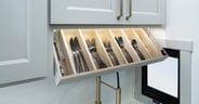A drop-down space for utensils in the Brinkley Model G 3250