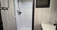 Forest River Arctic Wolf Cherokee 331BH 2025-13-OdS-Bathroom