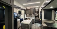 Forest River Arctic Wolf Cherokee 331BH 2025-16-OdS-Living Area Kitchen