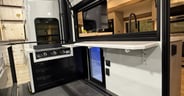 The drop-down TV can be watched from the patio party deck