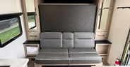 There's a sofa at the front of the Grand Design Imagine AIM 15RB