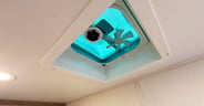 A small noisy vent fan in the bathroom