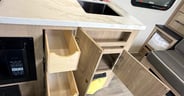 Hidden drawers add to the space in the kitchen of the Grand Desi