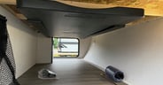 A folding picnic table in a convenient spot in the pass-through