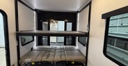 When deployed you could use the couch and upper bunk to sleep up to four.