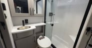 A spacious bathroom which can be accessed from the bedroom or the hallway.