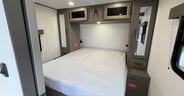 The bedroom of the Transcend 325BHT features a proper queen-size
