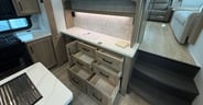 A front cabinet with lots of storage would be a great place for