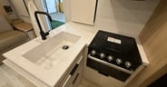 Counter tops in the Thrive series are fiberglass which is lighte