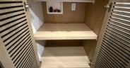 Full washer and dryer hook-ups in the bedroom closet of the Thri