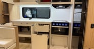 Good drawers and storage in the kitchen including a cabinet with