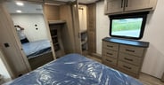 Good storage plus a provision for a washer-dryer in the bedroom