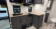 A decent amount of counter space and a multi-function sink in the Ibext 16MKS