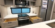 Nicely-finished drawers with utensil bay and reinforced drawer bottoms