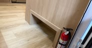 One of two shoe cubbies right at the door of the Winnebago Thriv