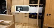 Other than a small oven the kitchen is good in the Winnebago Thr