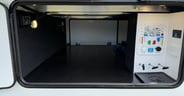 Pass-through storage and wet bay in the Reflection 337RLS
