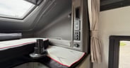 Power outlets plus A/C vent in the upper berth make this space mo