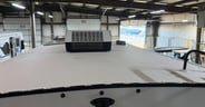 The roofing is an Alpha Ply system on the Winnebago Thrive 24RKS
