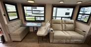 Theater seats and a table that can also be a desk