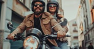 couple riding on a motorcycle
