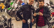 Men in motorbike salon