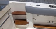 Boston-Whaler-350-Realm-midship-step-down-scaled-e1758738255206